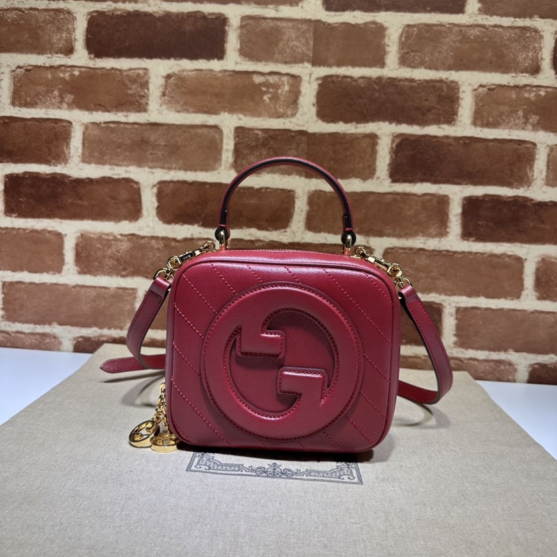 G*u*i top handle bags